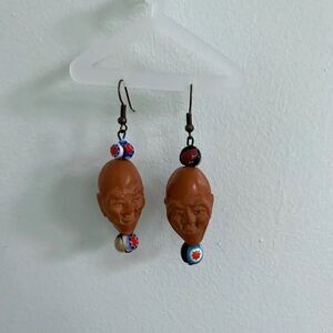 Chinese Carved Jolly Face Olive Pit Earrings